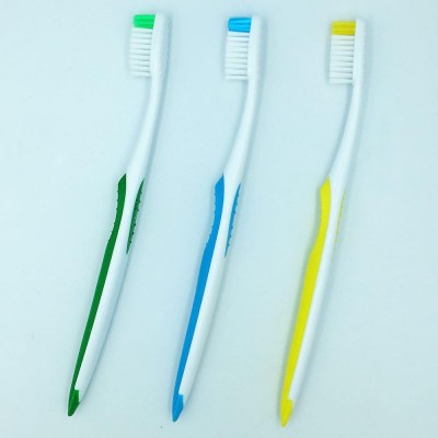 Wholesale super slim tapered polyester bristles toothbrush for those with sensitive teeth