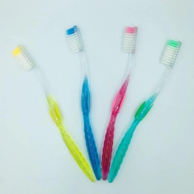 Wholesale 360 PS material transparent non-slip handle soft tip nylon bristle adults toothbrush made in China yangzhou